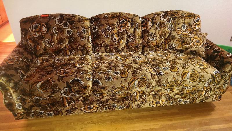 Brown floral sofa