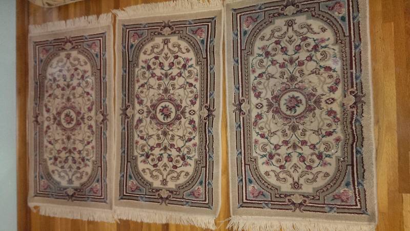 Three matching rugs