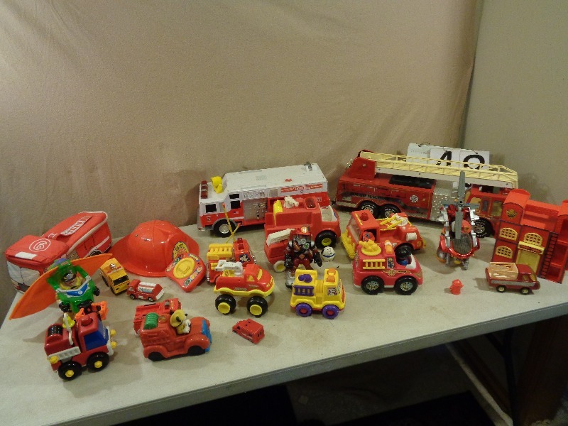 Assorted Toy Fire Trucks and More