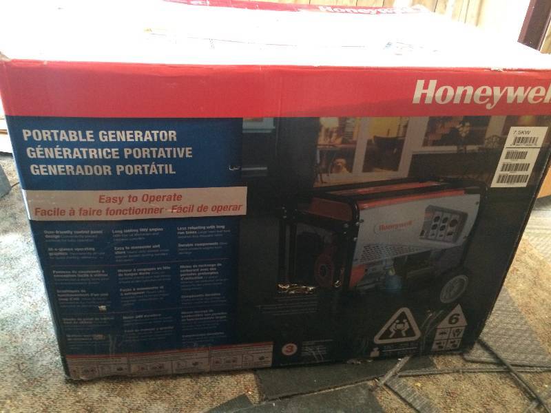 lot 1 image: Honeywell 6039 7,500 Watt 420cc OHV Portable Gas Powered Generator with Electric Start