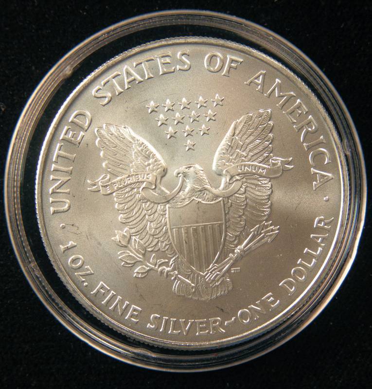 lot 15 image: 2006 AMERICAN SILVER EAGLE 1 TROY OZ. .999 FINE SILVER DOLLAR IN AIRTITE HOLDER
