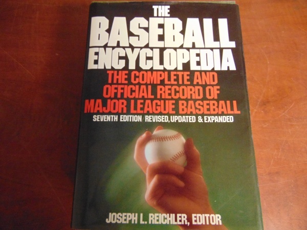 lot 9 image: Baseball Encyclopedia and Football Mask