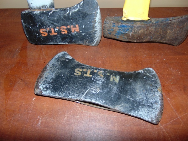 lot 55 image: (2) Axes and (1) Ax Head