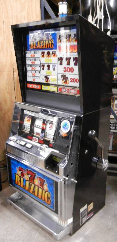 lot 1004 image: BLAZING 777 REEL SLOT MACHINE