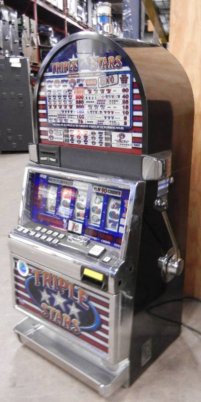 lot 1002 image: TRIPLE STARS REEL SLOT MACHINE
