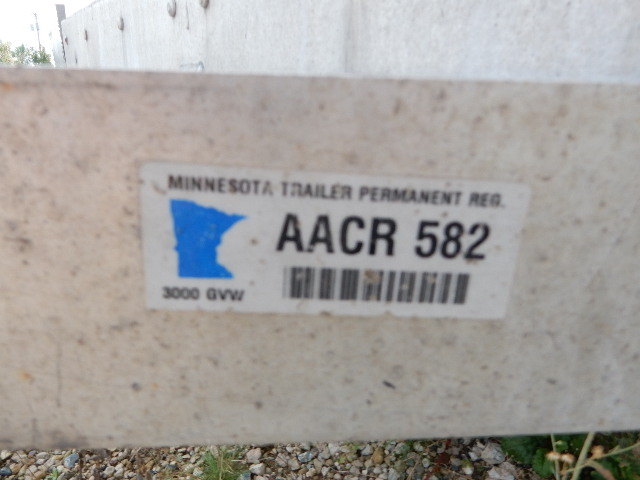 lot 10 image: 2001 Enclosed Cargo Trailer.. Set up as a motorcycle trailer.. Perm. License