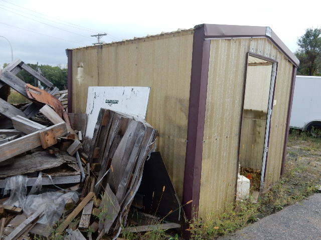 lot 16 image: NEED a SHED.. 112in x 112in x 96in h..  Metal Sides.. Good shape.. Wood floor.. No door.. Opening 36in x 80 in.