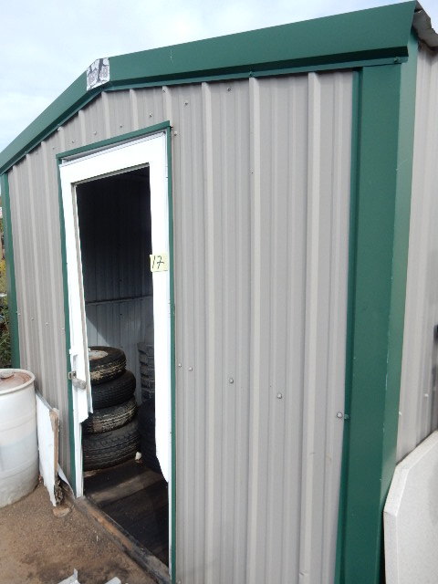 lot 17 image: NEED a SHED.. 112in x 112in x 96in h..  Metal Sides.. Good shape.. Wood floor.. No door.. Opening 36in x 80 in.