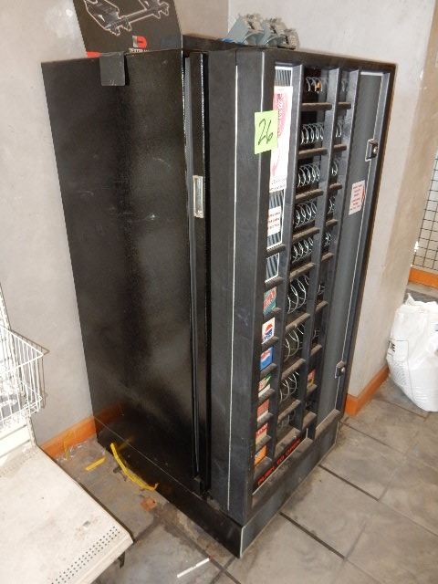 lot 26 image: Soda and candy Vending machine..