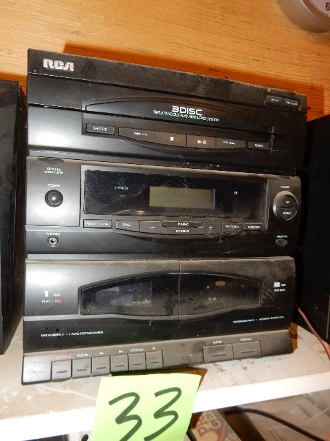 lot 33 image: STEREO System, RCA 3 Disc System, RP 9316 Receiver, 2 tape playerrecorder.. 2 RCA Speakers