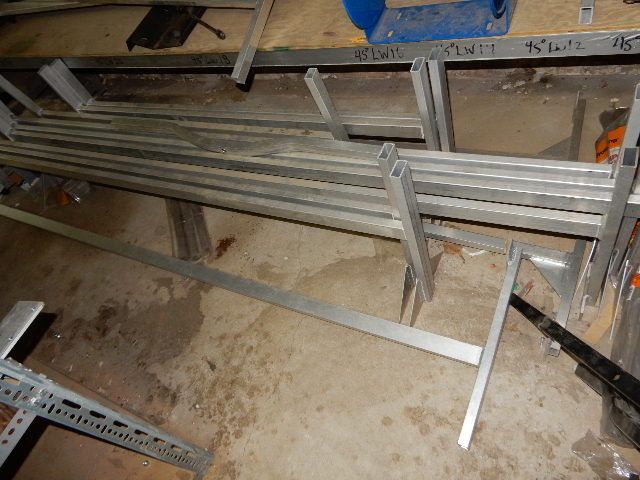 lot 57 image: 25 sections of ladder racks