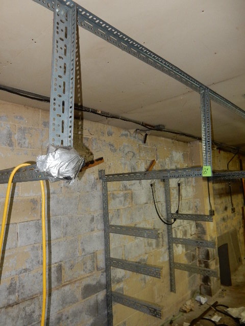 lot 63 image: Large lot of Hanging Shelving..