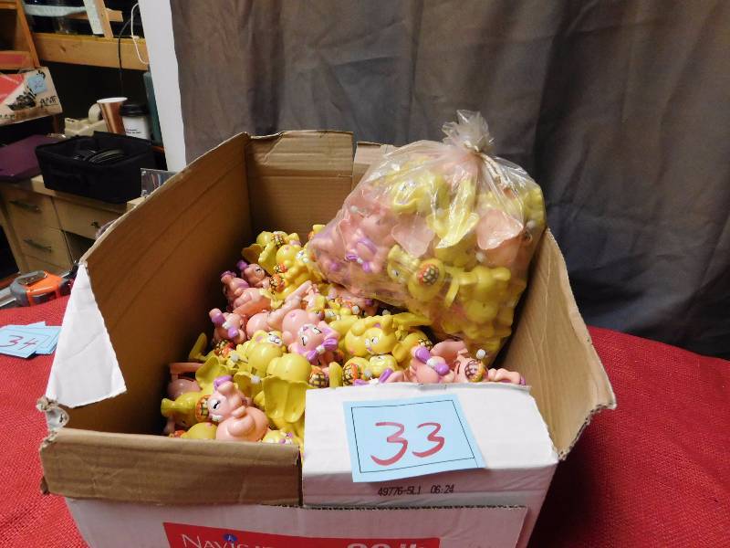 extremely large lot of pink and yellow wind up toys