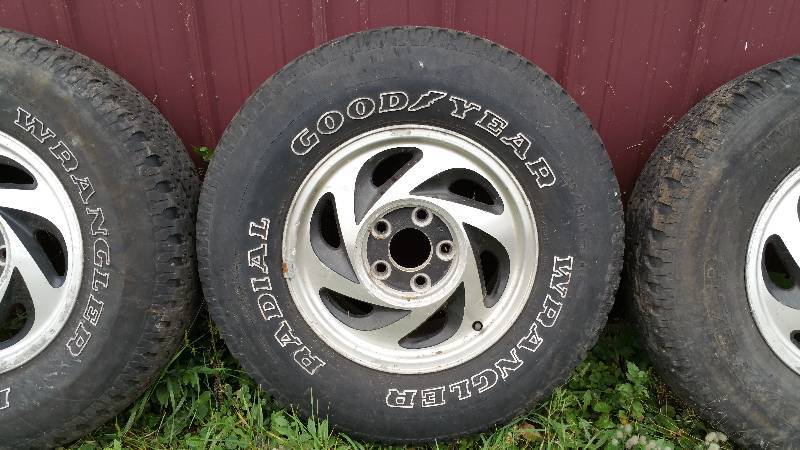 lot 3 image: Set of (4) Goodyear Wrangler Tires & Aluminum Wheels