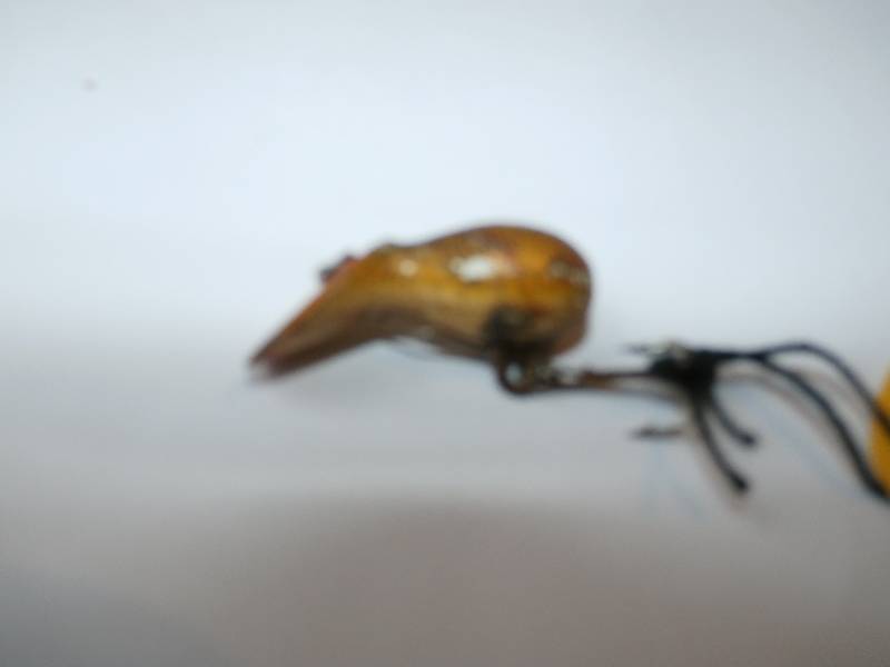 lot 21 image: Heddon - Widget fly rod lure