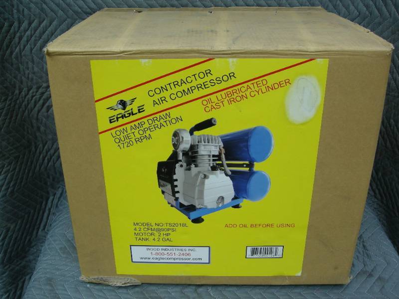 lot 20 image: Eagle Contractor Air Compressor