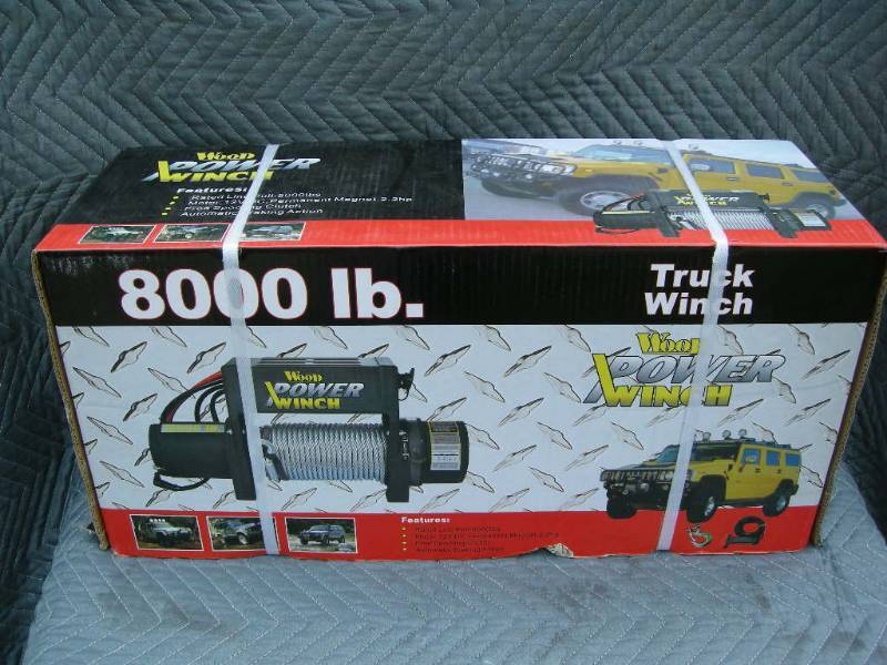 lot 28 image: Wood 8000lb Power Truck Winch