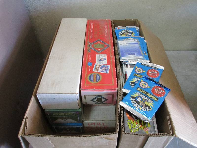 Football and baseball and basketball cards