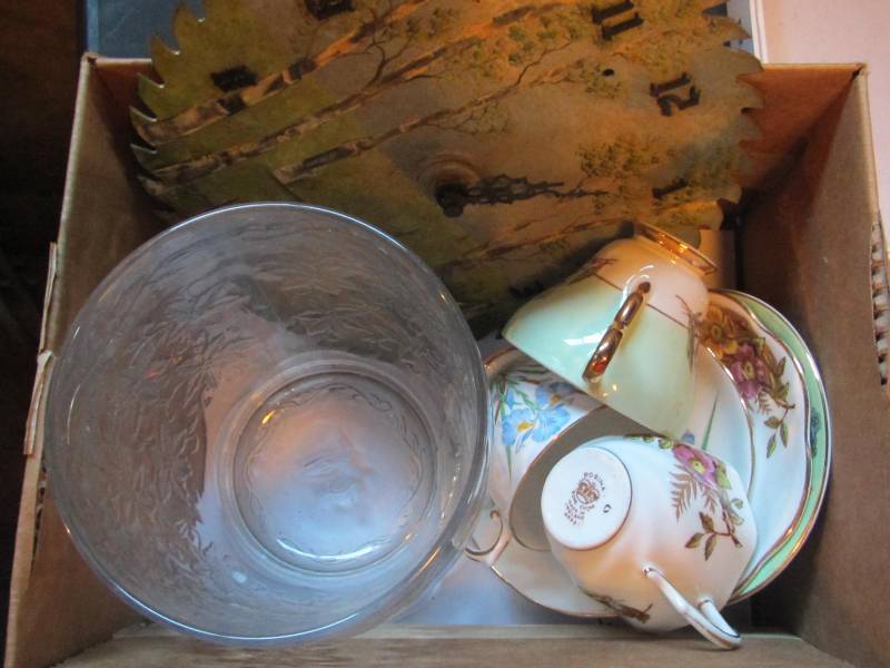 Fantasia vase, painted saw clock, three cups and saucers