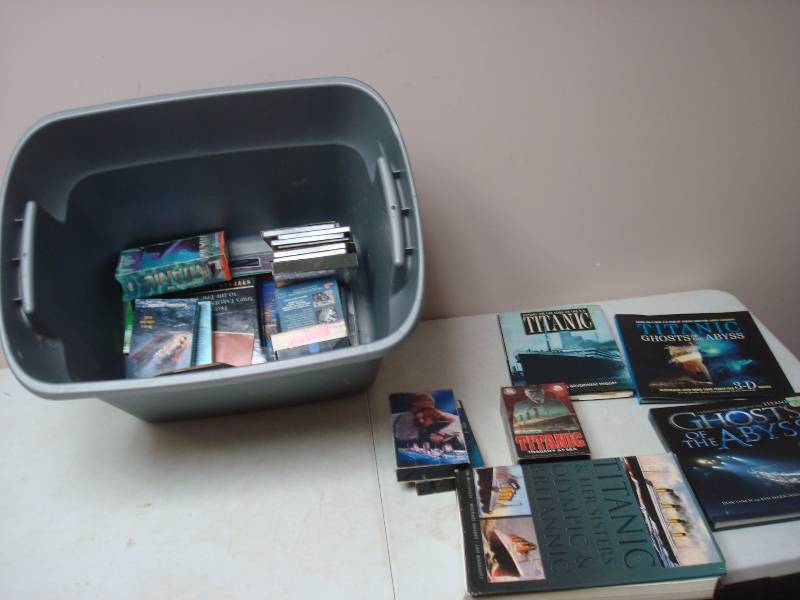 lot 77 image: Lot Of Titanic Items. Books, Movies, May Show Wear