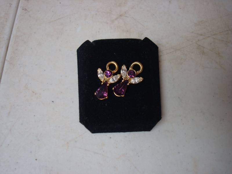 lot 79 image: Pair Of Purple Angel Earrings