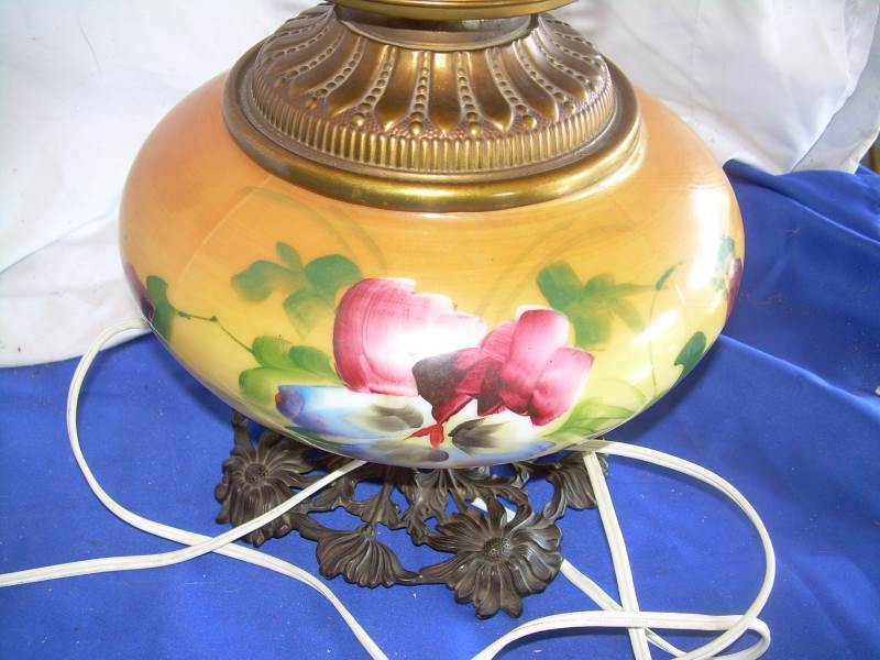 lot 85 image: antique oil lamp