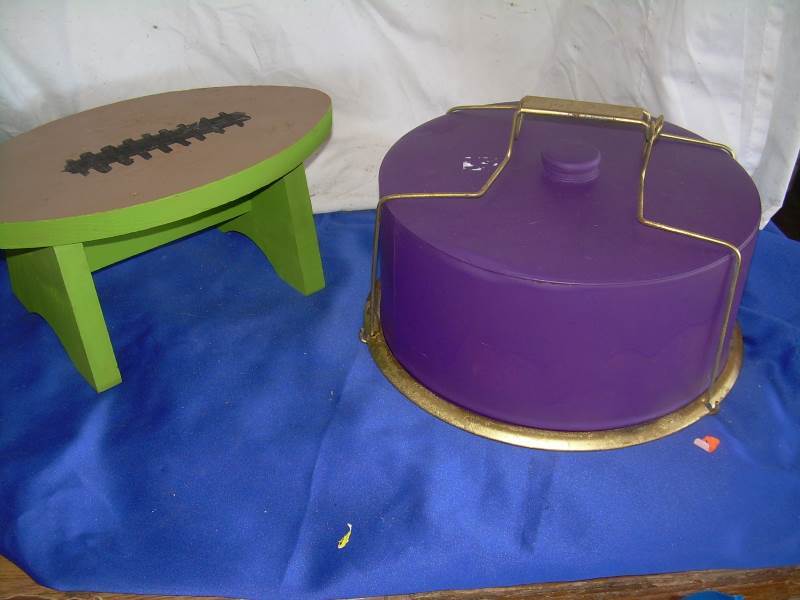 lot 87 image: Vintgae metal cake plate and football stool