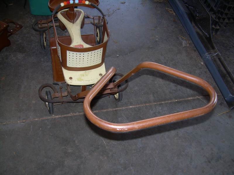 lot 99 image: Antique baby stroller