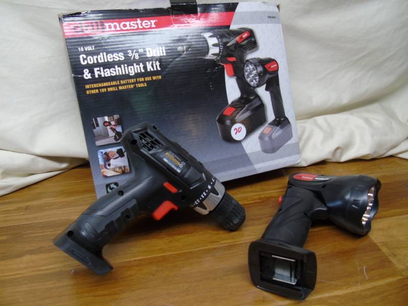 lot 20 image: Drill Master 18 Volt 38 in. Cordless DrillDriver And Flashlight Kit