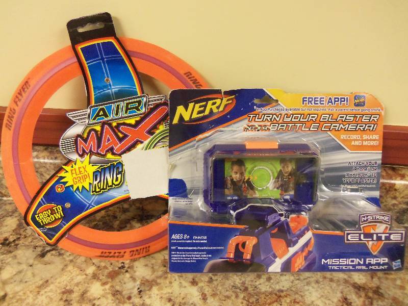 lot 15 image: Nerf Camera Mount, Air Max Ring Toss
