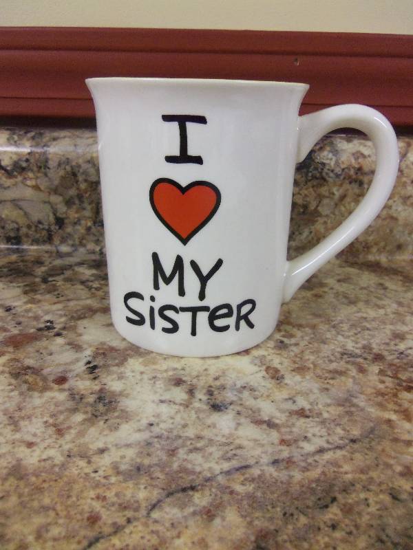 lot 39 image: I love my Sister Coffee Mug