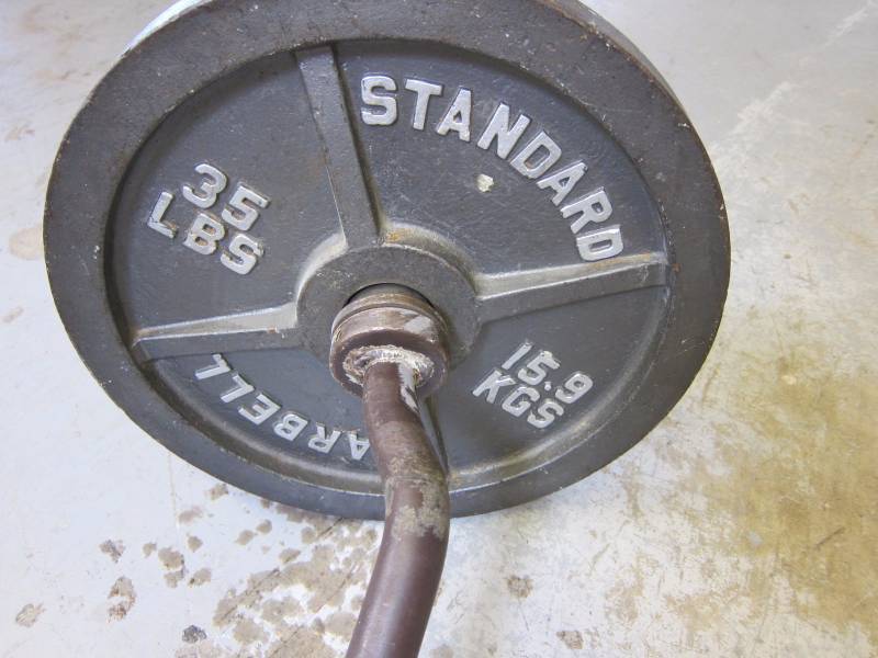 lot 76 image: Easy Curl Bar and Weights