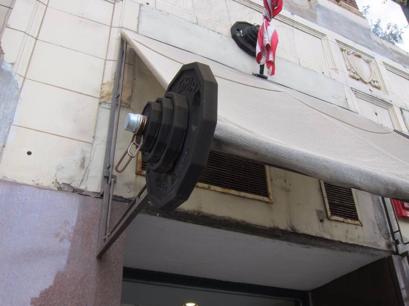 lot 38 image: Awning, Flag and Weights Display