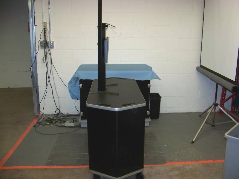 lot 95 image: Rolling AV (Audio Visual)  TV  Monitor Cart with Rack Area and Lockable Doors