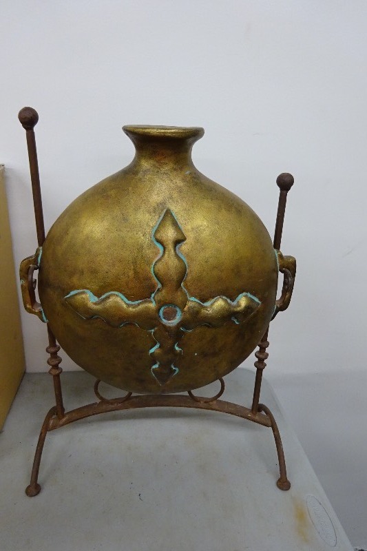 Ceramic vase on stand