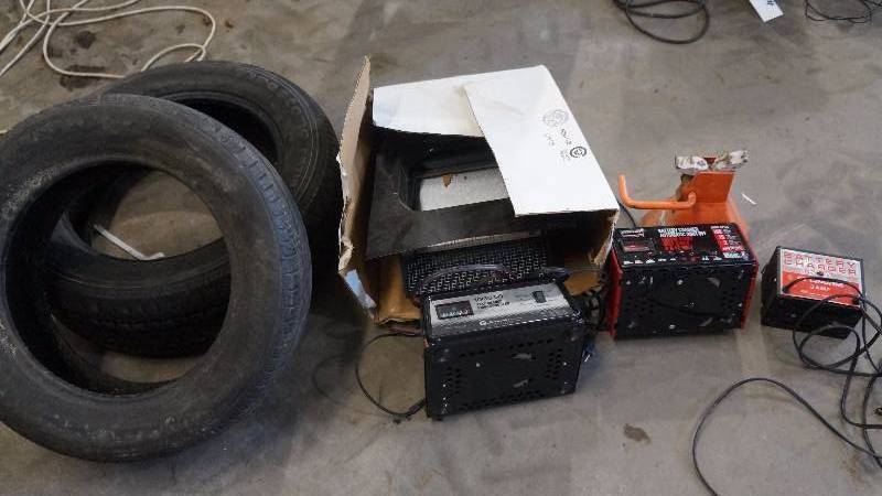 lot 47 image: NIB Roof Vent, 3 Battery Chargers, Adjustable Standing Jack & 2 Spare Tires