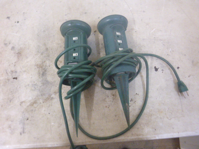 lot 107 image: 2 Outdoor 3-Way Outlet Spikes