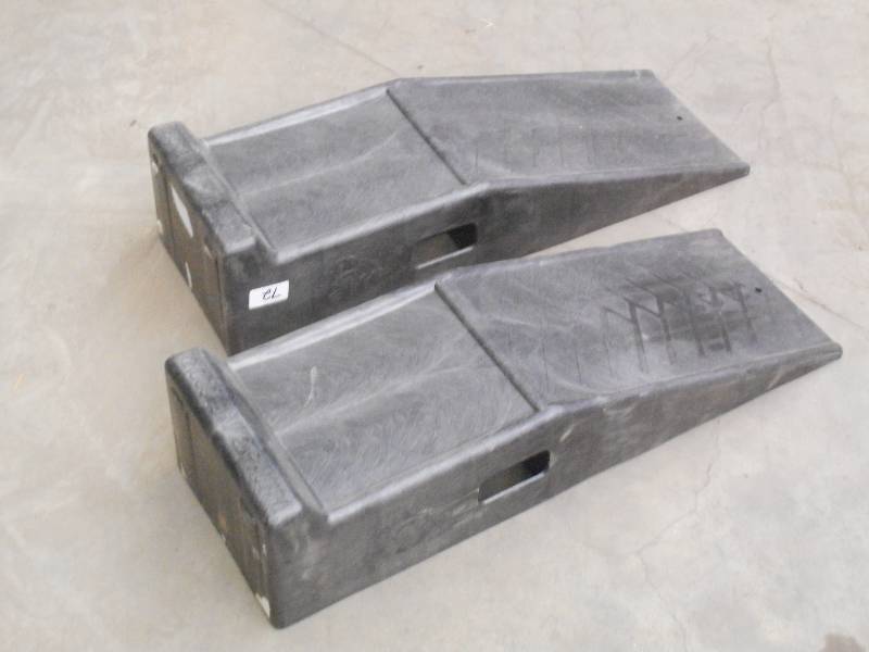 lot 72 image: (1) Set Of Plastic Car Ramps ...