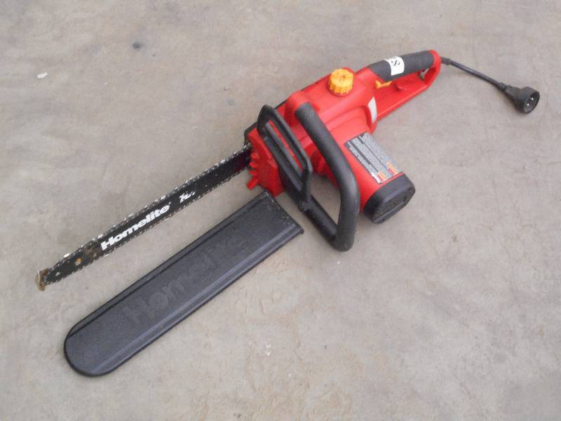 lot 82 image: Homelite Electric Chainsaw With Bar...
