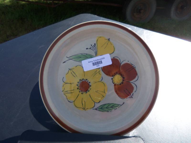 lot 8 image: 7 piece set of stoneware dining plates