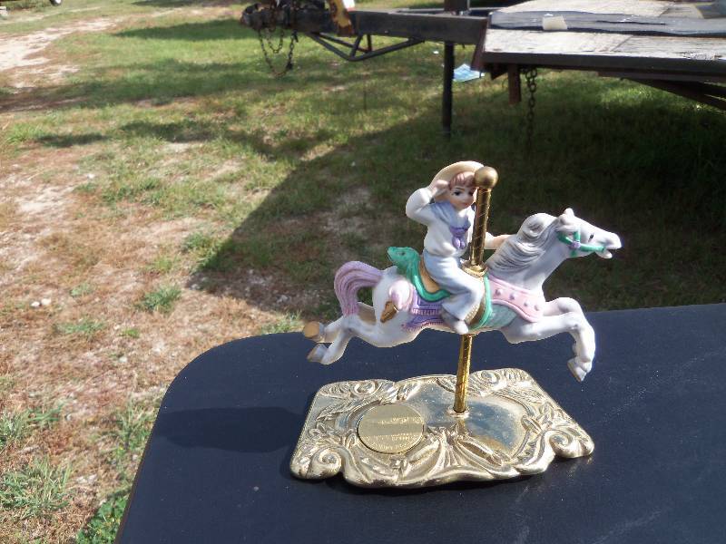 lot 26 image: carousel figurine