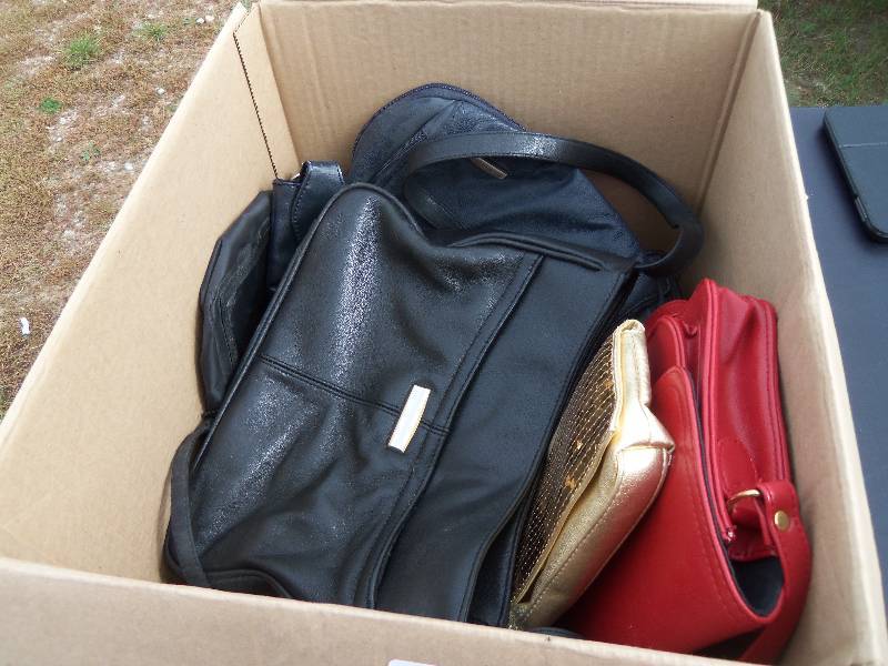 lot 32 image: box of purses, belts and wallets