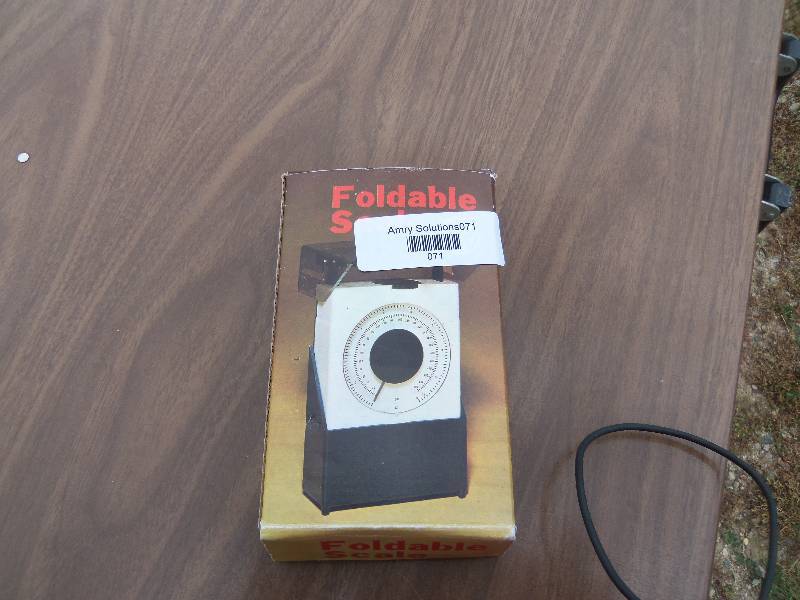 lot 71 image: foldable scale