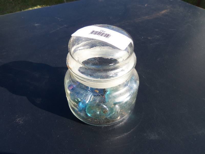 lot 140 image: Jar and Pebbles
