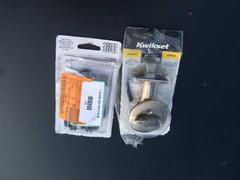lot 152 image: Kwikset Deadbolt and Door Chain