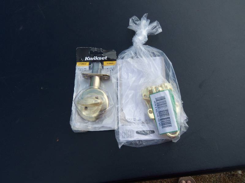 lot 153 image: Kwikset Deadbolt and Door Guard