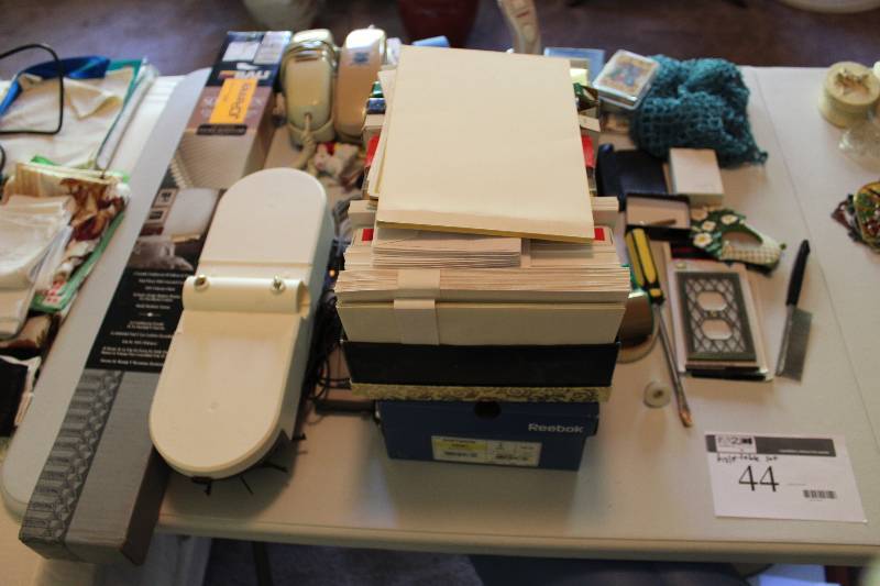 Half Table Lot Including Telephones Mesh Paper Comb And More.