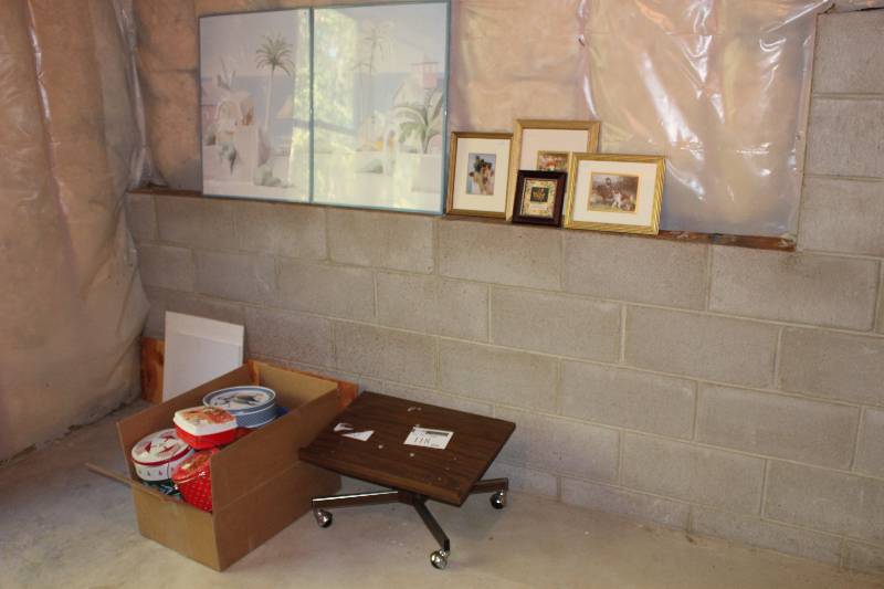 Corner Lot Including Wooden Table wWheels Framed Prints Box of Tins And More.