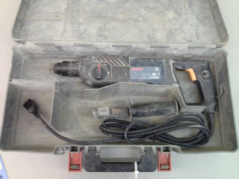 lot 66 image: Bosch 11224VSR Hammer Drill (1)