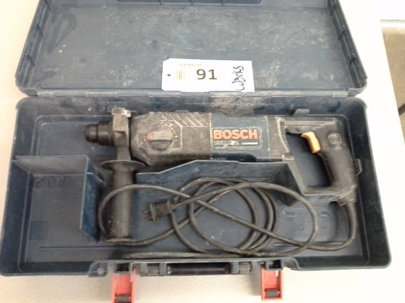 lot 91 image: Bosch 11224VSR Hammer Drill (1)